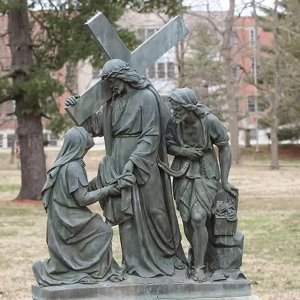 Bronze Way of the Cross Statue depicting Jesus holding Veronica’s veil as a Roman soldier stands beside him