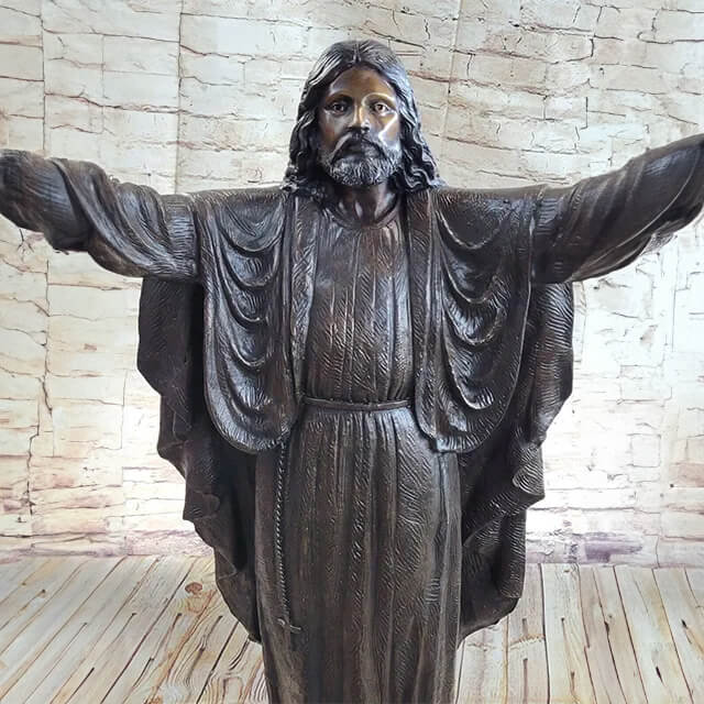 Front view of a Bronze Statue of Jesus with open arms