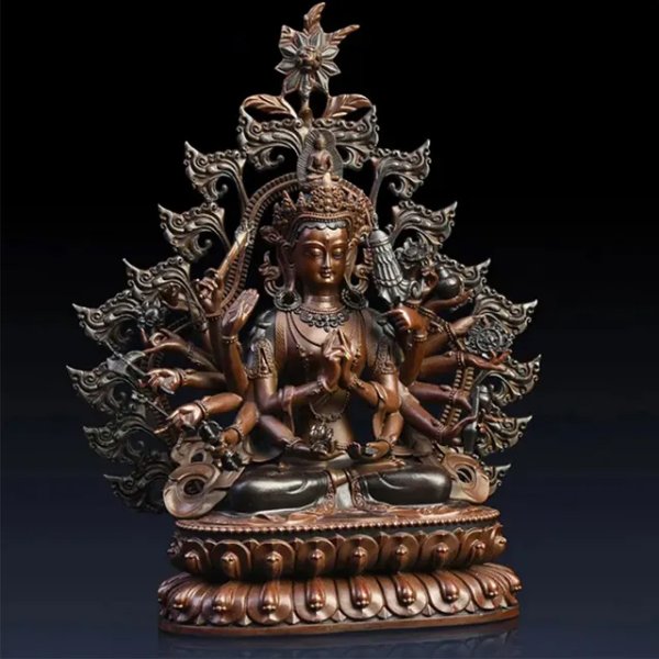 Frontal view of a bronze Thousand Armed Avalokiteshvara Statue seated on a lotus base