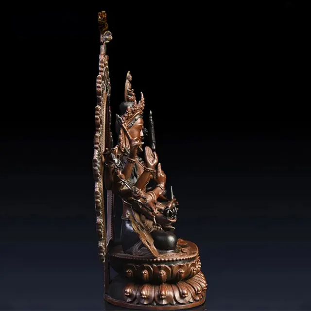 Side view of the bronze Thousand Armed Avalokiteshvara Statue showing intricate arm positioning and detailed lotus pedestal