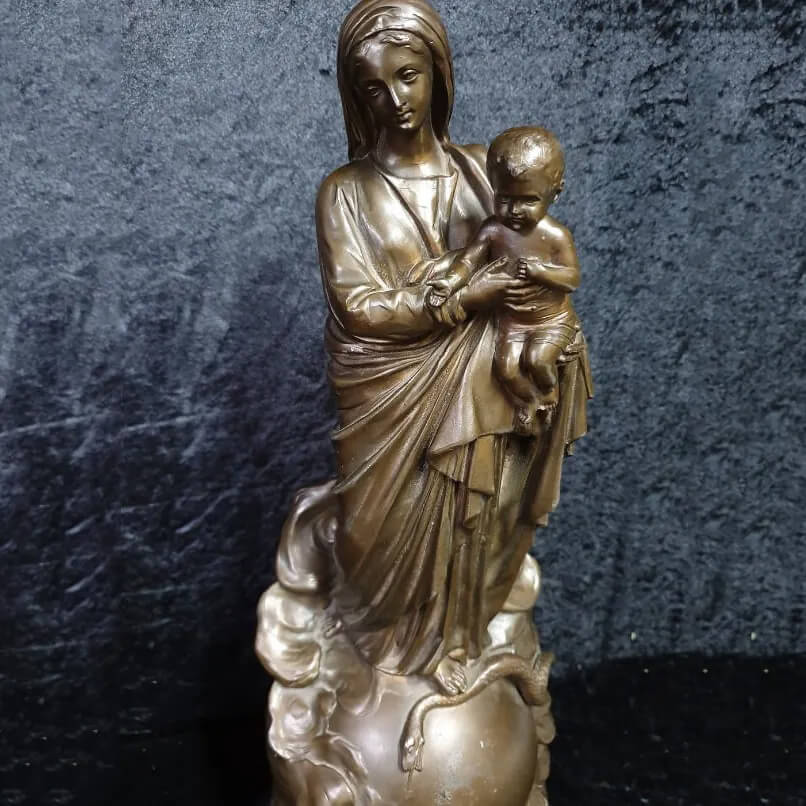 bronze Madonna and Child Sculpture, with the Virgin gently holding baby Jesus
