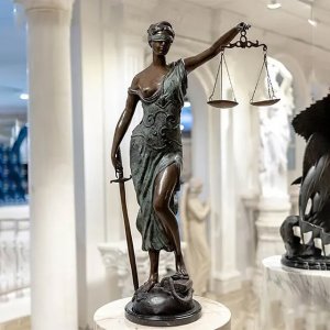 bronze Statue of Blindfolded Lady in flowing robes, holding a sword and scales