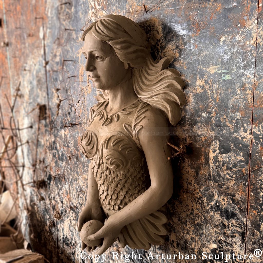 Side angle of clay Mermaid Bronze wall fountain sculpture