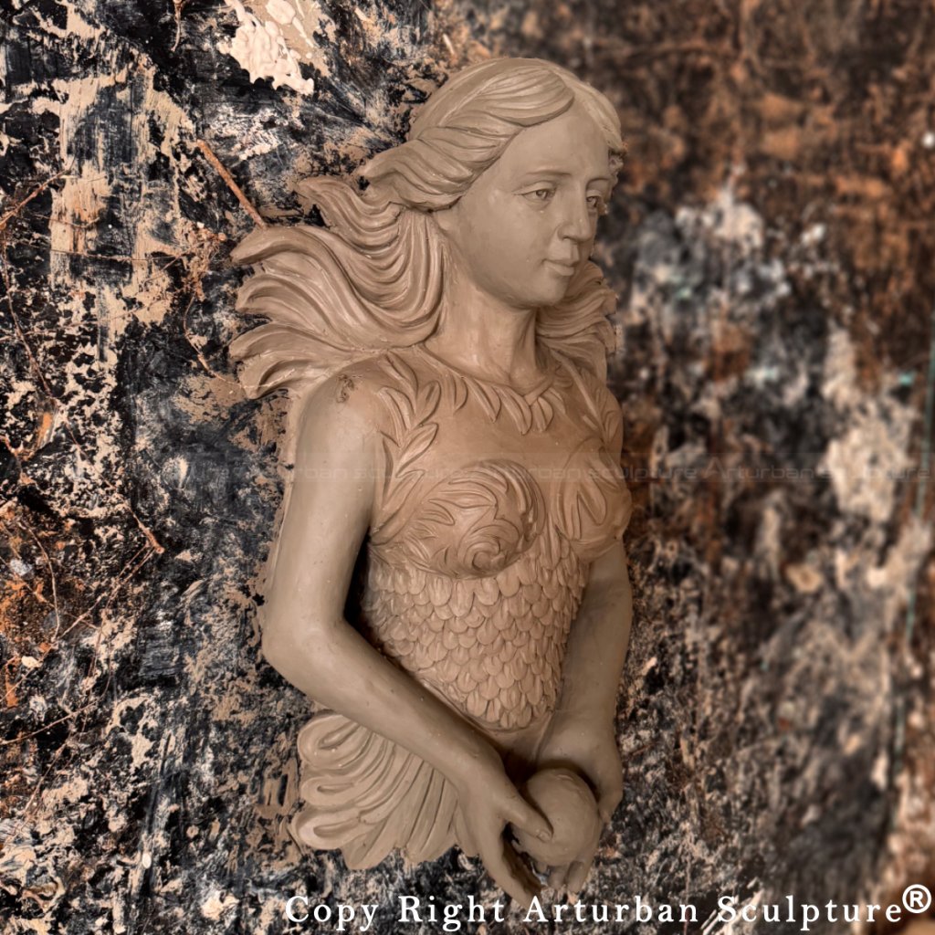 Clay model of Mermaid Bronze wall fountain sculpture with flowing hair and rounded orb in hands
