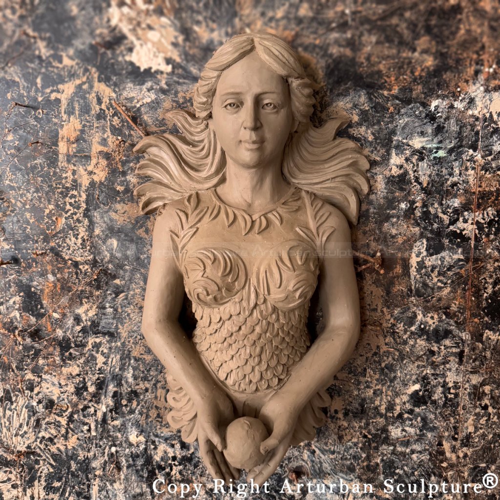 Front view of Mermaid Bronze wall fountain in clay stage