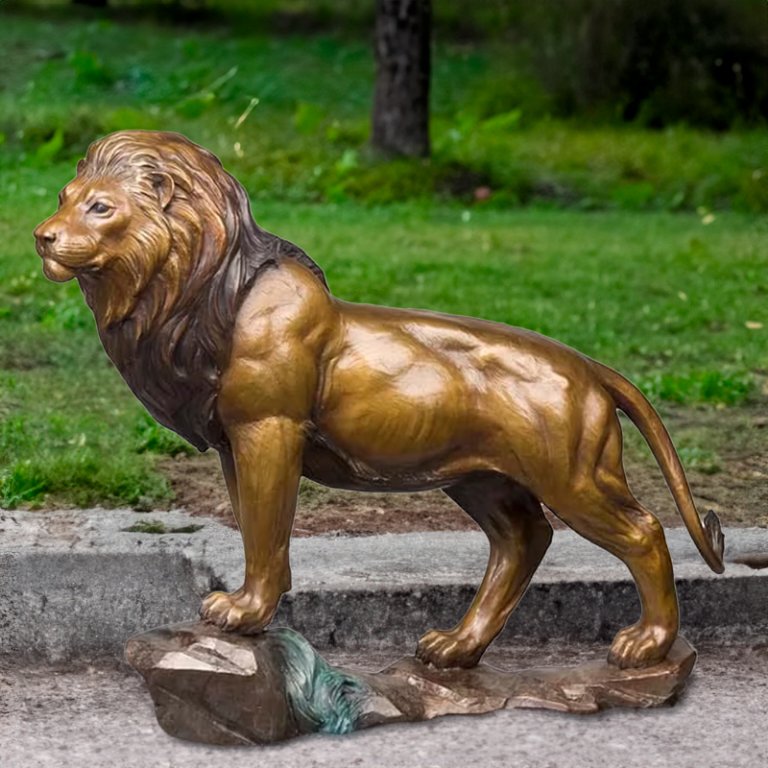 African Lion Statue featuring a bronze male lion standing proudly on a rock base