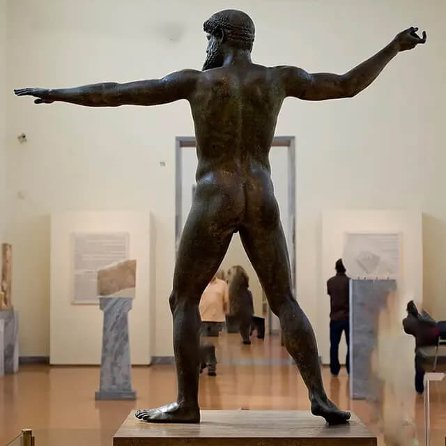 Artemision Bronze Sculpture, displaying the detailed musculature and balanced stance