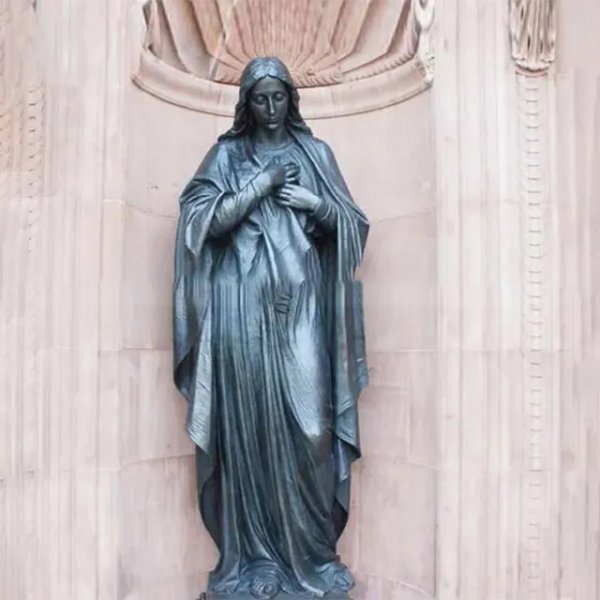 Bronze Holy Mother Statue showing the Virgin Mary with hands on her chest