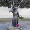 Bronze Padre Pio Garden Statue showing Saint Pio wearing a Franciscan robe and carrying a large cross