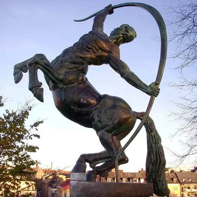 Centaur Garden Statue made of bronze, depicting a mythological half-man, half-horse figure lifting a large bow