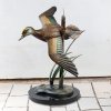 Flying Duck Garden Ornament featuring a bronze American Wigeon in mid-flight with spread wings and naturalistic coloring