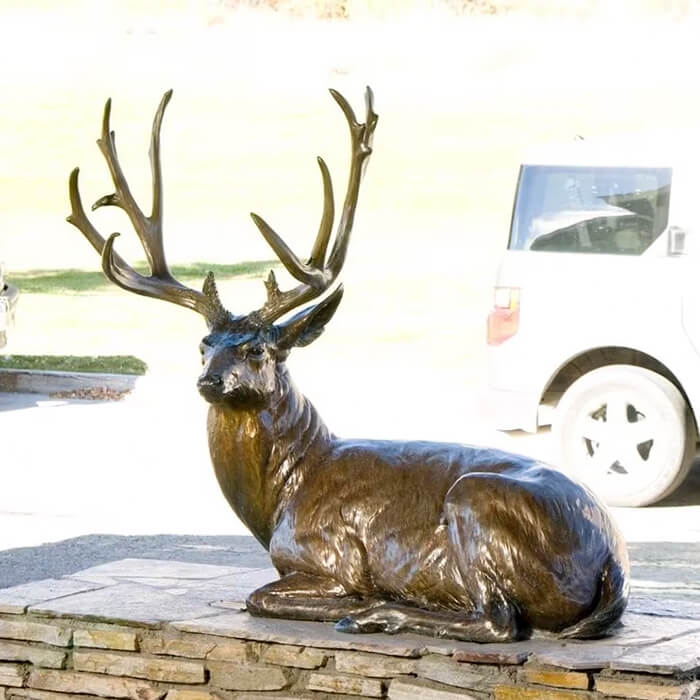 bronze Garden Stag Sculpture depicting a mule deer with branching antlers