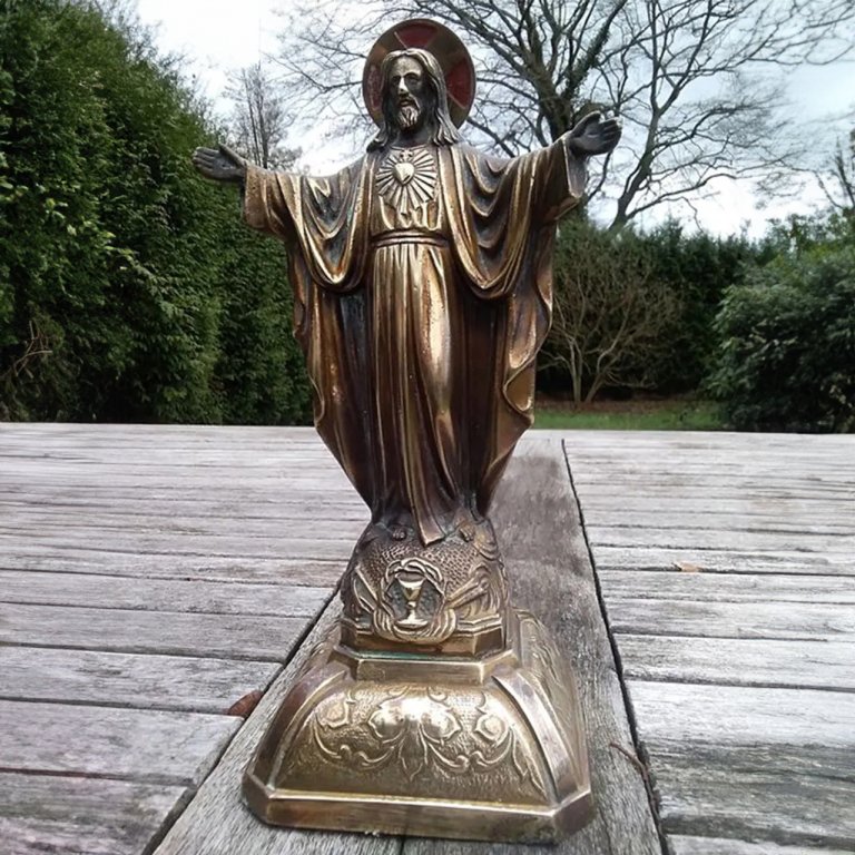 bronze Sacred Heart of Jesus Sculpture with open arms and heart symbol on chest