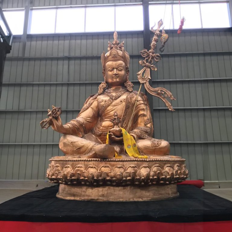 bronze Tibetan Buddhist sculpture of Padmasambhava, seated on a lotus pedestal
