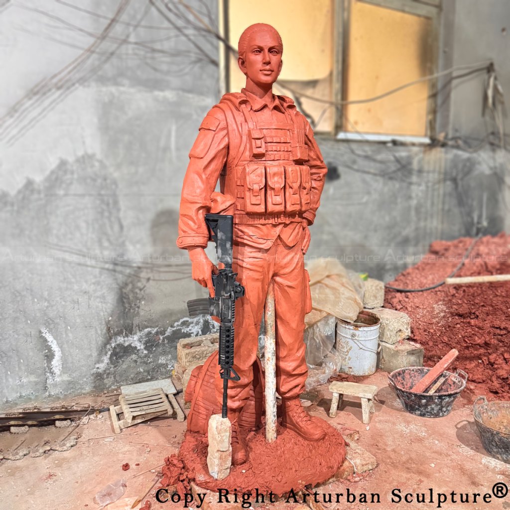 2-Female Soldier Statue clay sculpture holding a rifle and wearing a tactical vest
