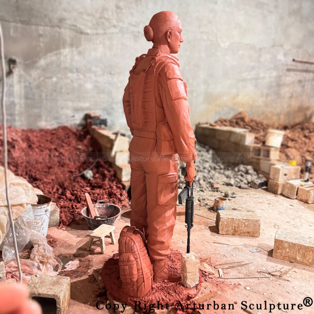 2-Rear view of the Female Soldier Statue clay model