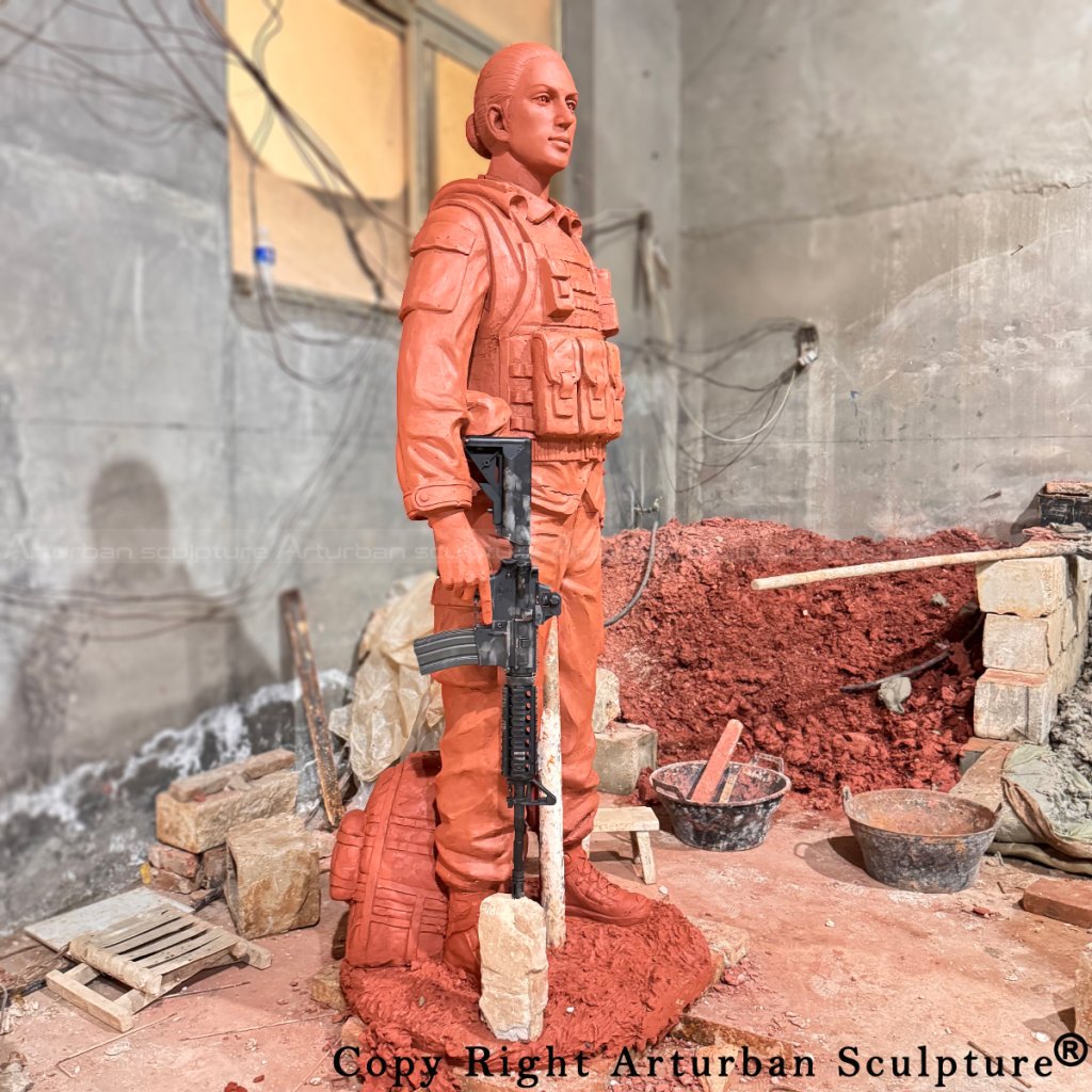 3-Female Soldier Statue clay model with one hand holding a M4 Carbine