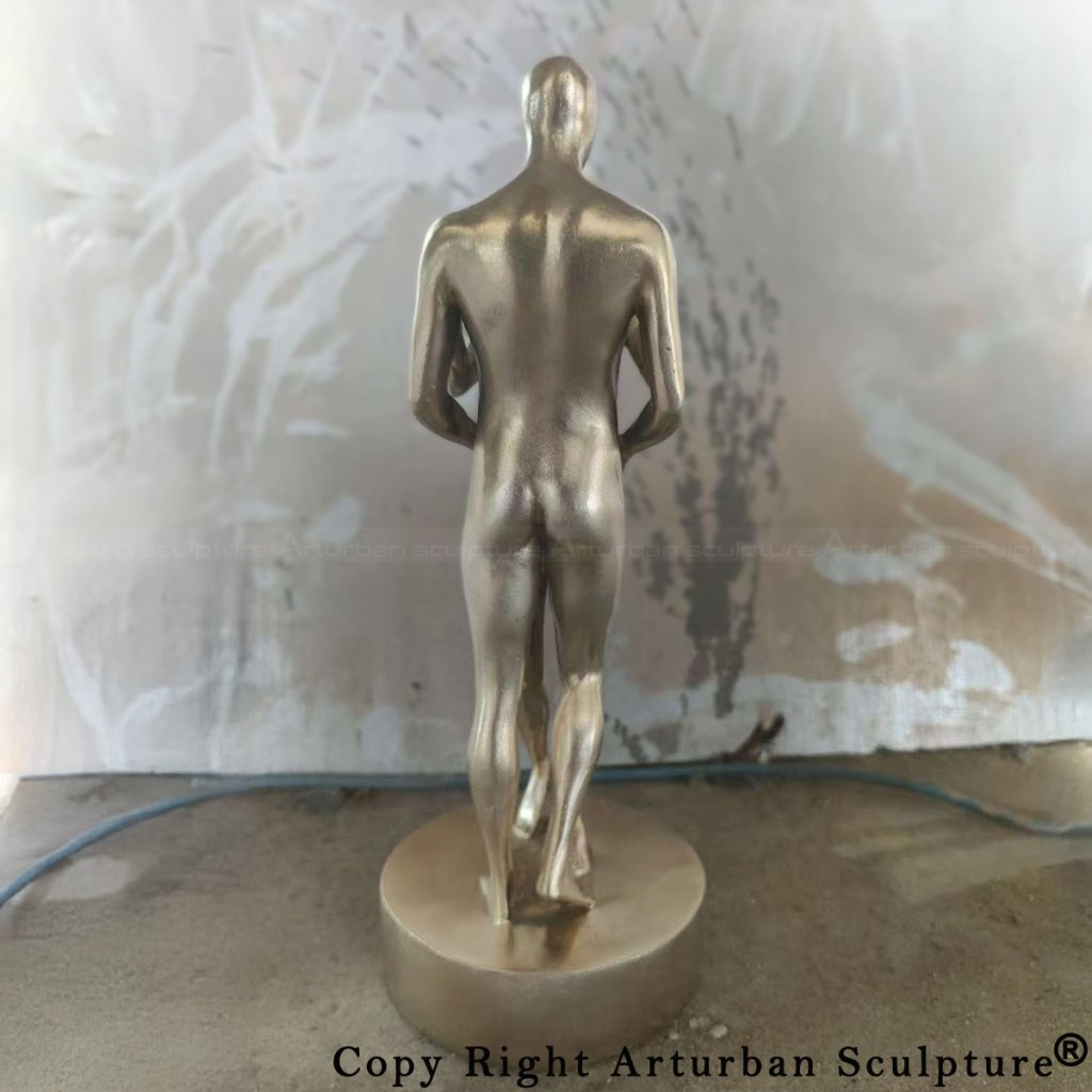 In Every Lifetime I Will Find You sculpture in progress, male figure viewed from the back during plating