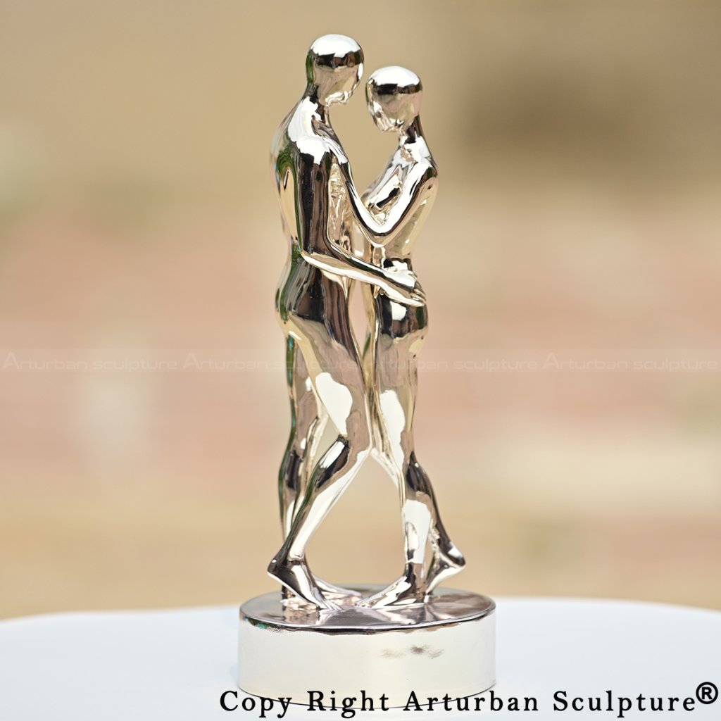 In Every Lifetime I Will Find You stainless steel sculpture of couple embracing