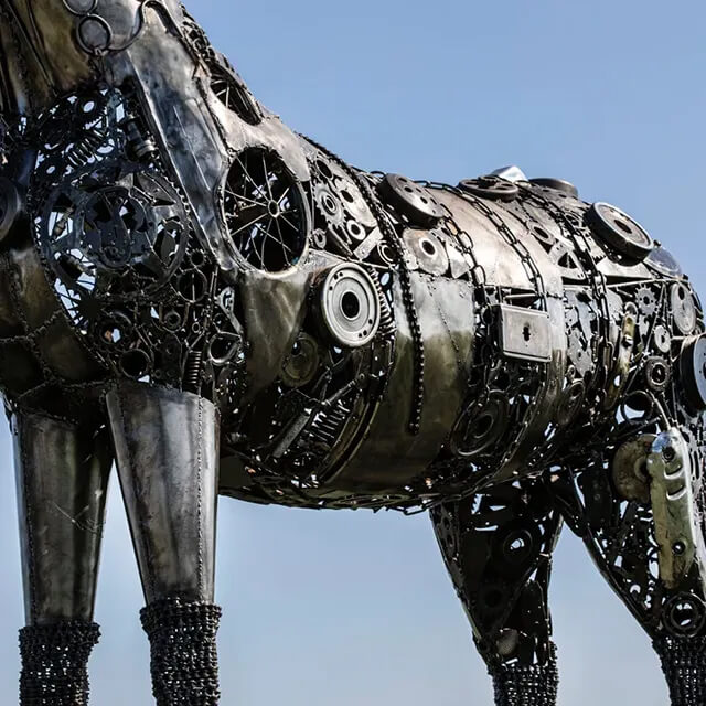 Detailed midsection of stainless steel Steampunk Horse showing complex metalwork and gears