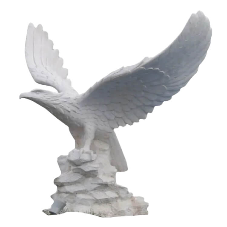 Elegant Marble Eagle Sculpture depicting a bald eagle standing atop a rock with majestic wings spread