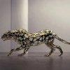 Sebastian Novaky's stainless steel Leopard Sculpture in a cautious walking pose