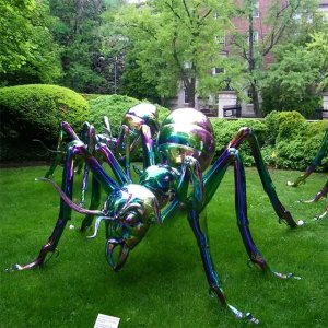 stainless steel Giant Ant Statues installed on green lawn