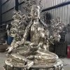 Green Tara Garden Statue in polished stainless steel, seated gracefully on lotus base