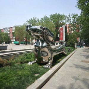 Stainless Steel Dog Statue featuring a cartoon-style dachshund with a mirror-polished surface