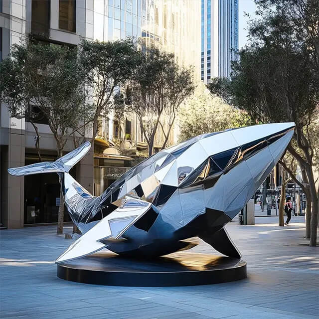 Stainless Steel Fish Sculpture of a geometric whale with mirror-polished surface