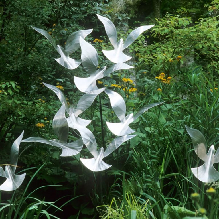 Stainless steel Dove Garden Statue featuring a flock of abstract doves in flight