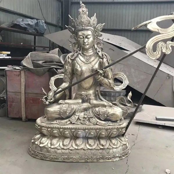 Stainless steel Manjushri Buddha Statue sitting on a lotus base