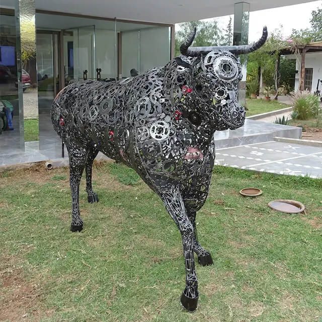 life-size Scrap Metal Bull Sculpture built from layered scrap components