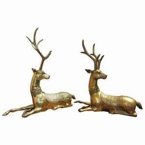 Brass Stag Statue featuring a recumbent design with detailed decorative patterns