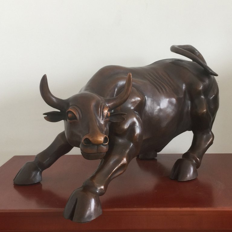 Bronze Bull Market Sculpture with detailed horns and determined expression