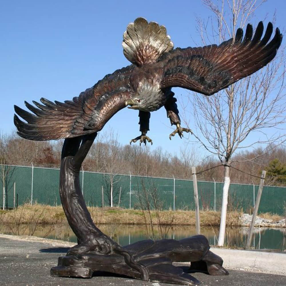 Bronze Hunting Eagle Statue diving forward with claws extended.