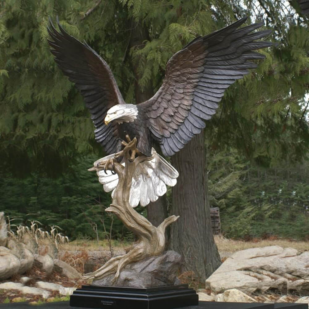 Bronze Hunting Eagle Statue perched on tree trunk with wings open