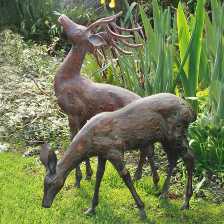 Bronze Stag and Doe Garden Statues with lifelike details of grazing and standing deer