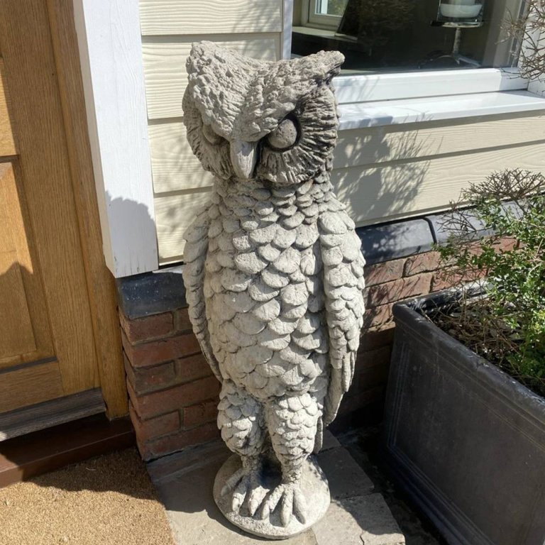 Cast stone Carved Owl Sculpture featuring horned owl with detailed carved feathers
