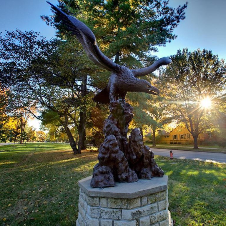Eagle Bird Statue in bronze perched on rocky base