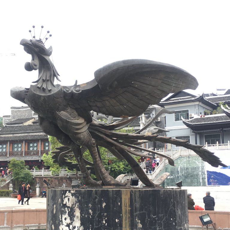 Large Bronze Phoenix Statue spreading its wings on a pedestal