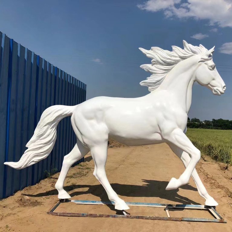 Large White Running Horse Sculpture in fiberglass depicting a dynamic running horse