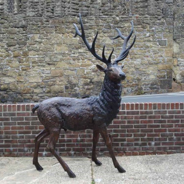 Outdoor bronze Large Stag Statue featuring a red deer with strong body and branching antlers